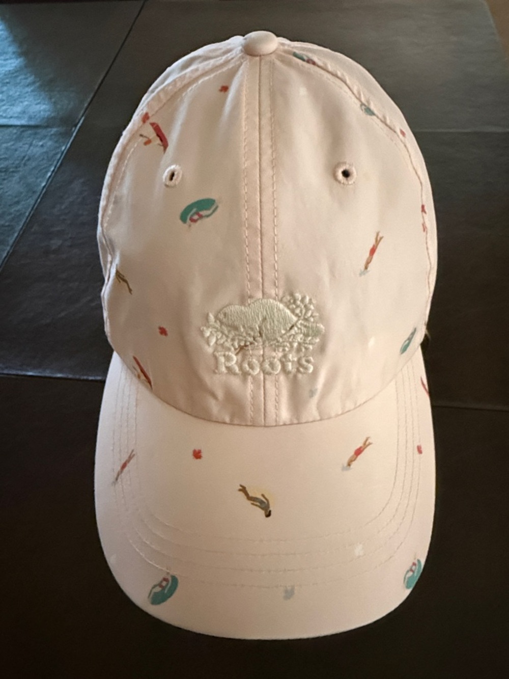 Roots Pale Pink Cap with Multicolor Swimmer Motif